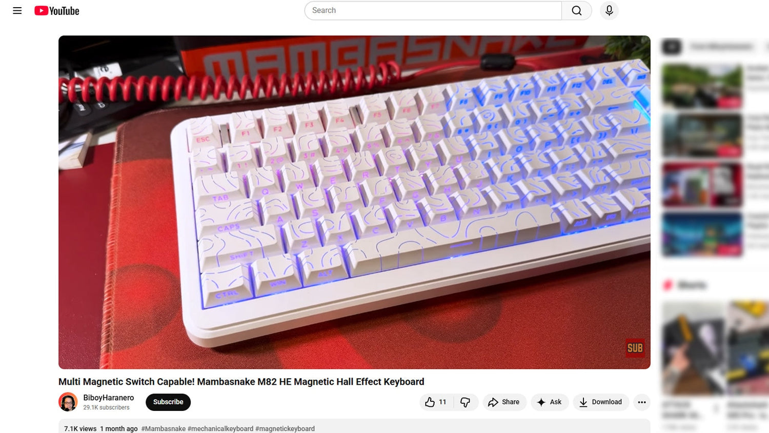 YouTube video of the Mambasnake M82 HE, a white mechanical keyboard with blue backlighting