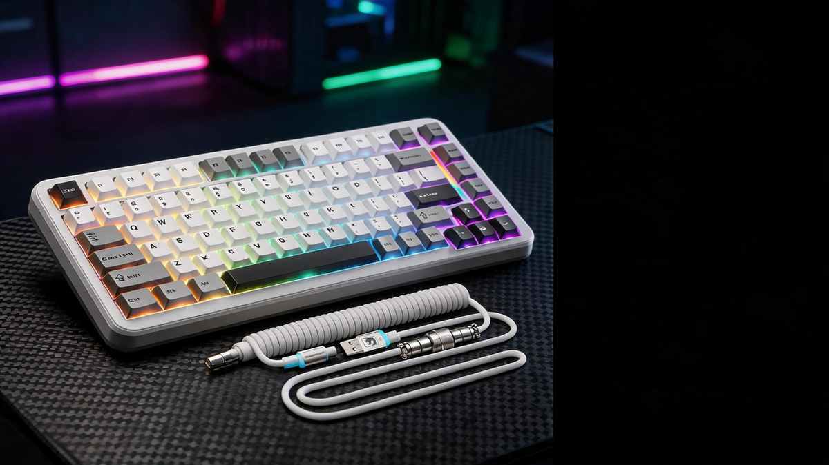 Cute gaming keyboard glowing on a dark RGB-lit gaming desk with room for headline text on one side