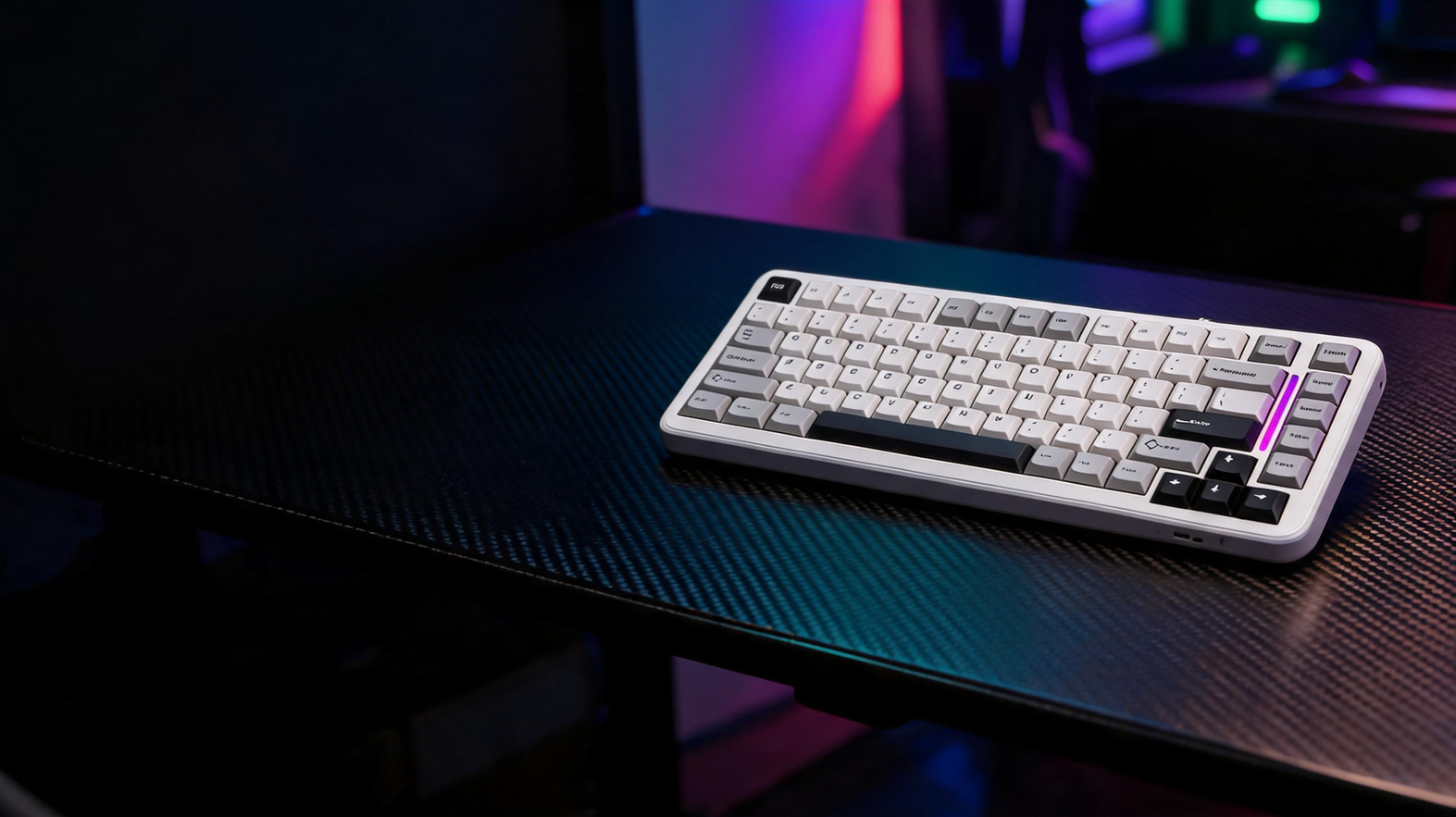 White RGB gaming keyboard on a dark carbon-fiber desk in a neon-lit gaming room
