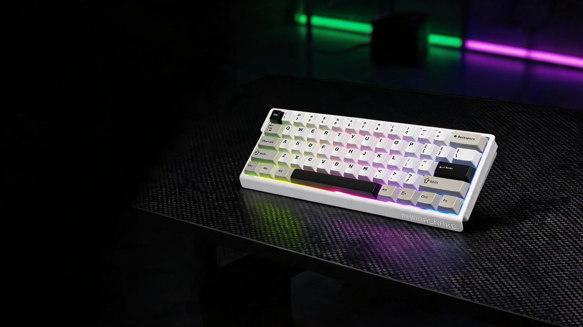 Compact magnetic gaming keyboard glowing on a carbon-fiber desk in a dark neon-lit esports room
