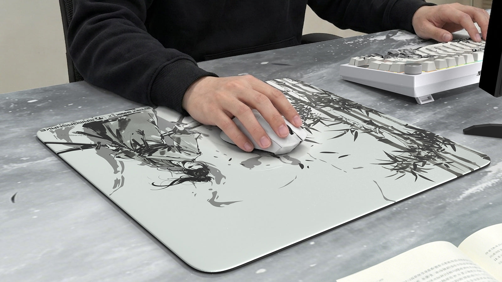 Glass mouse pad for gaming with a mouse and keyboard setup