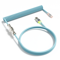 Light blue RGB coiled USB-C keyboard cable with metal aviator connector and USB-A plug