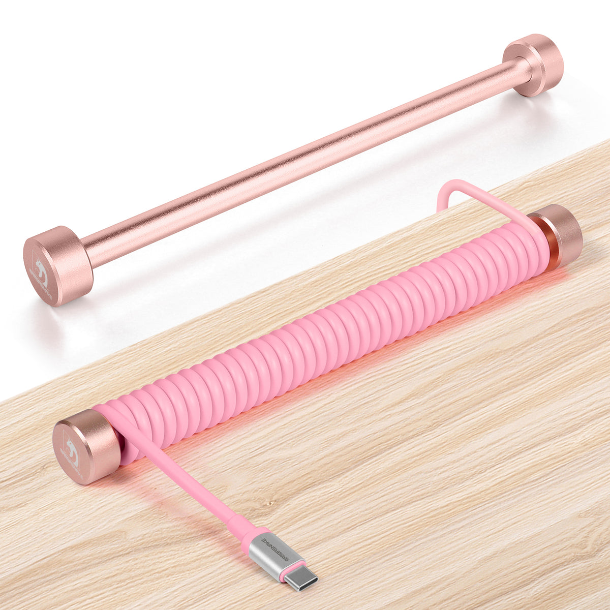 Rose gold aluminum rod and pink coiled USB-C keyboard cable winder